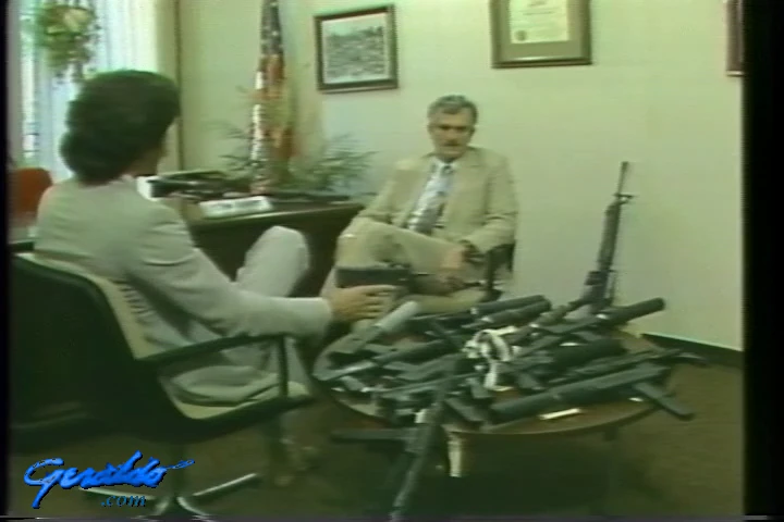 Machine guns on a table