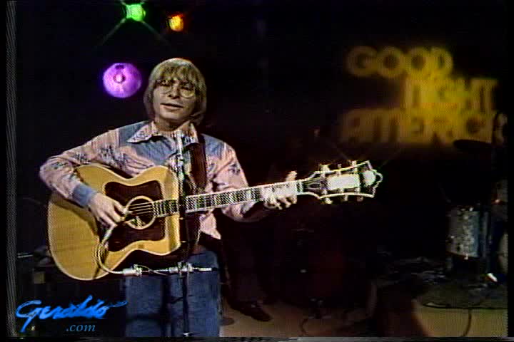 John Denver with guitar, 1974