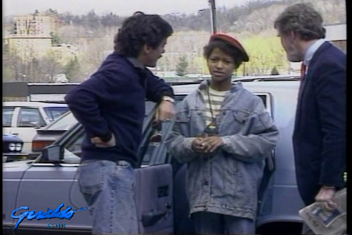 Girl standing beside car, 1992