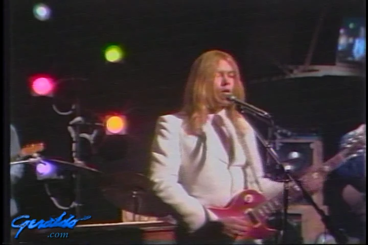 Gregg Allman playing guitar, 1975